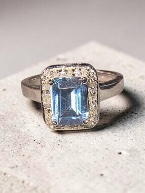 Blue Topaz, Clear Gemstone And Sterling Silver Halo Ring